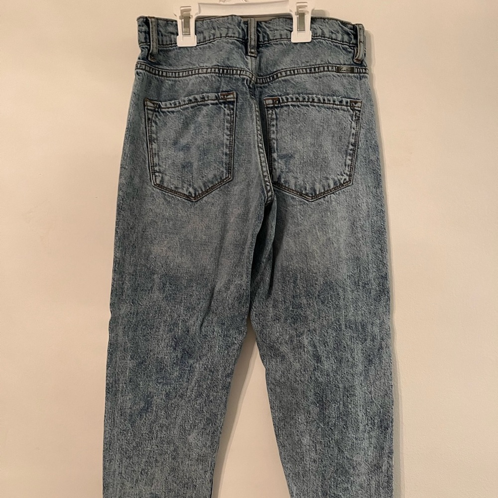 Distressed light wash jeans